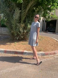 Friday chill. Dress that I love, pony tail that is rare for me. Happy weekend