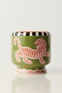 The A Dopo Collection by Paddywax is designed to bring the zest and thrill of a summer abroad to the comfort of indoor spaces. Featuring the vibrant hues and inviting patterns of Morocco, each 8 oz ceramic vessel is meticulously hand-painted with individual brushstrokes for an artisan feel. When the wax runs out, simply repurpose the vessel as a one-of-a-kind planter or vase to add some color and whimsy to your next outdoor dinner party! This collection is perfect for travel enthusiasts, pottery collectors, and those with a distinct style of their own. * 8oz * Made in the USA * Cruelty-free & vegan * Paraben-free & phthalates-free * Hand-painted ceramic vessel **Scent Notes:** Eye: Incense + Smoke * Top: White Grapefruit, Mandarin, Cinnamon * Middle: Clove Bud, Spiced Orchid, Tonka Bean *