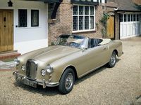 size: 24x18in Photographic Print: A 1963 Alvis Car Parked on a Gravel Driveway :