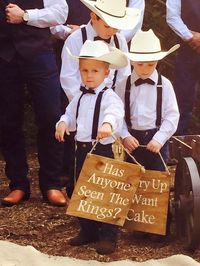 "These wood signs are such a cute way to have your ring bearers or flower girls enter and/or exit your wedding ceremony. Each sign measures 11\" x 11\" and is 1/4\" inch thick to ensure a light enough sign for the children to hold. Signs are hung with Jute. If you prefer a ribbon instead, send me a message so we can decide on a ribbon color. Each sign can be made with a wide variety of phrases and colors. The signs can be purchased as one sided or two sided. Please send me a message with the phr