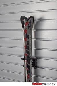 This accessory allows you to store both your skis and poles on a slat wall panel that hangs from the wall instead of on the floor or leaned against a wall in some corner. There's no reason to risk damage to these expensive pieces of sports gear when you can just as easily keep them stored safely and securely.