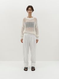 our open mesh knit sweat is a hand knitted crochet mesh jumper crafted from a blend of organic cotton, linen and lyocell. designed and owned in australiamade in vietnam main: 35% lyocell, 35% organic cotton, 30% linen