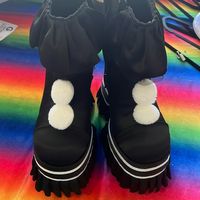 Dollskill Clown Platform Shoes! So Cool And Sold Out These Are Brand New Size 8 Trickz N' Treatz Killer Clown Platform Booties - Black Cuz They'll Fall For Your Evil Tricks! These Ankle Boots Have A Satin Construction With Ruffle Trim, Pom Pom Details, Super High Platforms With Chunky Block Heels, And Side Zip Closures. Clown Core #Dollskill Clown Platform Boots#Tricksntreats