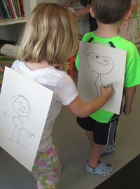 You have to see this fun drawing game for kids we played at our art summer camp in our children's art studio in Charlotte, NC.