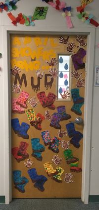 Spring Classroom Door April Showers Bring... MUD! Spring Showers Bring... MUD! muddy rain boots and muddy hand prints