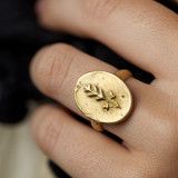 Made in his Soho NY atelier, this beautiful brass ring features an embossed branch of oak leaves. Wearing oak leaves was a sign of special status among ancient Celts, Greeks, and Romans.