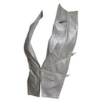 A fabulous silver grey leather vest from Ann Demeulemeester, one of the notable Antwerp six designers. It has a lapel collar and 2 hip length panels down the front which can be hooked closed of left open. The adjustable matching silver straps cross the back and can be worn in any number of configurations. One size fits most. Marked Italian size 38. Length 18"