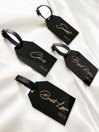 **PLEASE READ BEFORE PURCHASE** Personalized engraved acrylic luggage tags with black leather strap Great for gifts, party favors, place settings, weddings, wedding parties - bridal party, groomsmen. Each luggage tag is 2.5"W x 4"H x 1/8" thick and comes with a black leather strap. Solid color acrylic (ex: black, white, clear) will be engraved on the face of the bookmark and engraving can be filled in with a paint color choice of - black, white, silver, gold, rose gold, or none. Mirrored acrylic