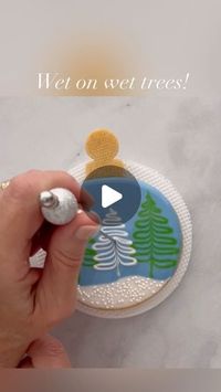 Mary Mansfield on Instagram: "I had the pleasure of creating this ornament cookie design for @annclarkcookiecutters 🌲 It’s another fun wet on wet technique, that’s quite simple to do. Visit the Ann Clark website to see more tutorials on how to decorate this shape in other ways, as well as design inspiration for other ornaments and holiday shapes!🌲❄️🌲  #cookievideo #cookiedecoratingvideo #cookiedecoratingtutorial #cookietutorial #royalicingtransfers #christmascookies #royalicing #ornamentcookies #wetonwetcookies  #royalicingcookies #decoratedcookies #icingcookies #decoratedsugarcookies  #cookiedecorating #cookiesofinstagram"