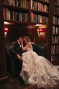 Intimate wedding at the broadmoor hotel in colorado springs. Vintage, moody, dark academia library elopement photos inside Pourtales Library.