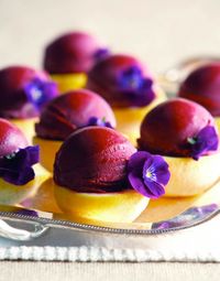 Blackberry Cabernet Sorbet - served on a Lemon halve w/ a pansy garnish. Pretty & delicious <3