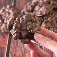 Crockpot Candy is a must make for the holiday season! It’s like chocolate covered peanuts but better! Only 4 ingredients and made completely in the slow cooker. It makes a ton so it is perfect for Christmas cookie tins or holiday parties!