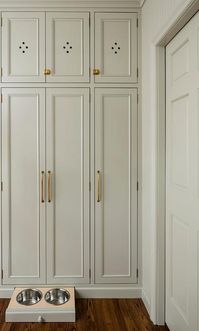 Mudroom with Custom Pull Out Dog Food Bowls - Transitional - Laundry Room