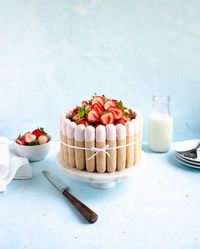 Nothing says "strawberry season" quite like this strawberry champagne charlotte: 2 layers of mousse and a sponge cake base all topped off with lady fingers and fresh strawberries.