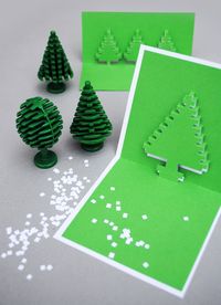 mini-eco | Trees pixel popup cards | Instructions: http://www.minieco.co.uk/christmas-pixel-popup-cards/#