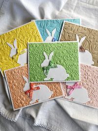 Adorable Easter bunny notecards in assorted colors!  Perfect for sending an Easter greeting to friends and family.  Each has been 3D embossed using two different floral patterns and heavy weight cardstock.  The bunny is accented with a coordinating gingham  bow.  Inside is blank for you to add your own sentiments. Each set of six cards comes gift boxed with a wired gingham bow.  They are perfect to use personally or to use as a hostess gift, teacher gift, etc.