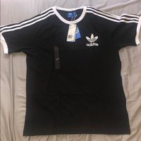 Up For Sale Is A Classic And Iconic Adidas Tee. It Is Brand New In Size L.