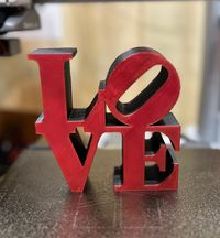 Massive Philadelphia Love Sculpture Replica Statue - 3D Printed Desk Art Size: 6.9" x 6.9" x 1.5" thick      175mm x 175mm x 40mm Price: $45.00 Celebrate love with this iconic Philadelphia Love Sculpture replica statue, perfect for adding a touch of romance to your desk or as a gift for someone special. The timeless design, now available in 3D printed form, can be personalized in a dual-color scheme to match any decor. For Single color, please select the same primary and secondary color. for dua