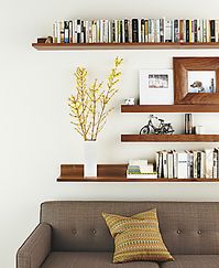 I like the look of one loooong shelf that could hold all of my books above my bed