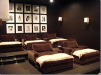 Basement theater...the ultimate in lazy but it sure looks comfy!