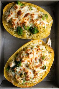 Stuffed Spaghetti Squash filled with juicy chunks of chicken, tender broccoli, and an easy cheesy filling. Comforting and surprisingly healthy, your whole family will love digging into their own low carb gluten-free Chicken and Broccoli Stuffed Spaghetti Squash Boat.