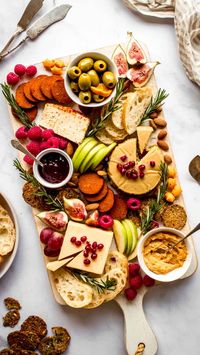 This impressive vegan cheese board is actually much easier to make than you think! All you need is a few ingredients and a chopping board or plate. You'll have a vegan charcuterie board in no time! Perfect as a Christmas snack or easy party food.