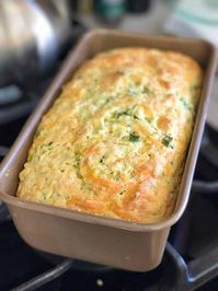 This Savory Zucchini Quick Bread requires no yeast or rise time or buttermilk! It is our favorite quick bread recipe! #quickbread #zucchinirecipes #savoryquickbread #easybread #cheddarquickbread #cheeseyzucchinibread