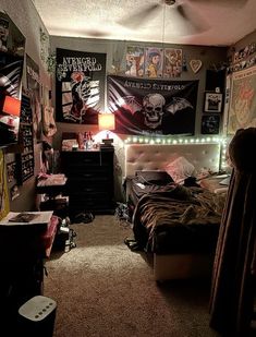 a bedroom with many posters on the wall