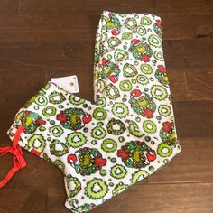 Dr Seuss Womens Grinch Pajama Pants Red Green Sz L Plush Nwt Christmas Holiday Casual Christmas Sleepwear With Elastic Waistband, Casual Christmas Holiday Bottoms, Casual Christmas Holiday Pants, Casual Holiday Pants For Christmas, Christmas Cotton Loungewear Bottoms, Christmas Cotton Bottoms With Elastic Waistband, Christmas Holiday Long Pants Sleepwear, Red Festive Bottoms For Winter, Christmas Holiday Sleepwear With Long Pants