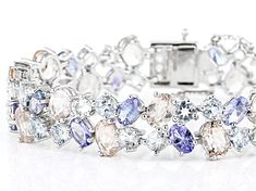 6.25ctw Round Aquamarine, 6.25ctw Oval Tanzanite, 6.25ctw Oval Morganite, And 0.20ctw Round White Zircon Rhodium Over Sterling Silver Bracelet. Measures Approximately 0.47"W. Hidden Box Clasp With Double Safety. White Multi-stone Bracelet, Silver Multi-stone Diamond Bracelet, Fine Jewelry Silver Diamond Bracelet With Multi-stones, Formal Multi-stone Cubic Zirconia Tennis Bracelet, Multi-stone Cubic Zirconia Tennis Bracelet, Ring Spacer, Popular Jewelry, Box Clasp, Pink Gemstones