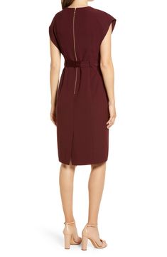 Create a long, lean silhouette with the help of flattering seams and a fitted waistline on this ruffle-sleeve sheath ideal for work or play. 41" length (size 8); 38 1/2" length (size 8P) Exposed back-zip closure V-neck Split flutter sleeves Ties at waist Side-seam pockets Back vent Lined 97% polyester, 3% spandex Dry clean or hand wash, dry flat Imported Dresses Belted Brown Dress For Work, Sheath Dress With Pleated Waist For Work, Career Sheath Dresses For Fall, Knee-length Belted Dress With Pleated Waist For Work, Midi Length Workwear Dress With Side Zipper, Fitted Belted Dress For Workwear In Fall, Fitted Belted Dress For Work In Fall, Belted Knee-length Dress For Work, Fitted Belted Dress For Fall Workwear