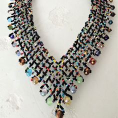 Artisan Czech Glass Bead 20" Long Fashion Statement "V" Style Necklace Black Multi-Color Glass Beads Necklace In Shimmering Beads & Iridescent Silver Beads Easy To Open/Close Magnetic Clasp An Incredible "Statement" Necklace One Of A Kind Necklace Handcrafted/No Two Are Exactly Alike Would Be Perfect For A Get-A-Way Destination Dress! This Is A Gorgeous Necklace Is Made In Guatemala Using Artisan Crafted Czech Glass Beads. Czech Glass Beads Are Know World Wide For Their Quality, Vibrant Color Unique Black Beads Necklace For Party, Multicolor Crystal Beads For Jewelry Making, Multicolor Crystal Beaded Necklace, Bohemian Black Crystal Necklace For Party, Multicolor Crystal Beaded Chain Necklace, Multicolor Crystal Beaded Necklaces For Party, Colorful Beads Crystal Necklace For Party, Handmade Multicolor Crystal Necklace, Bohemian Multicolor Crystal Beaded Necklaces