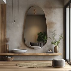 a bathroom with a mirror, sink and potted plant on the counter next to it