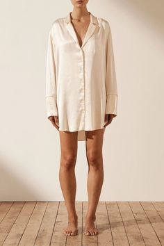 Elegant Long Sleeve Chemise For Daywear, Long Sleeve Silk Loungewear Dress, Long Sleeve Silk Dress For Loungewear, Silk Long Sleeve Loungewear Dress, Elegant Relaxed Fit Dress For Loungewear, Chic Spring Chemise, Elegant Cream Shirt Dress For Daywear, Elegant Cream Long Sleeve Shirt Dress, Elegant Long Sleeve Cream Shirt Dress