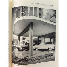 an open book with black and white photos of cars in front of a gas station