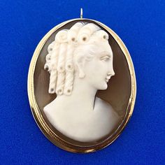 * Victorian 14K Yellow Gold Oval Carved Cameo Pin Brooch Option Pendant  * Length with bale: 1-3/4" * Length without bale: 1-5/8" * Width: 1-1/4" * Cameo measures: 1-1/2" x 1-1/8" * Weight: 8.6 tgw * Marked: 14K * Condition: Great * Chain is not included but can be purchased at an additional cost. * G1243    Exported By ExportYourStore :) Carved Oval Brooch For Formal Occasions, Carved Oval Brooch For Formal Wear, Carved Oval Brooches For Formal Wear, White Oval Cameo Brooches, Heirloom Oval Brooches With Intaglio, Luxury Oval Engraved Brooches, Classic Oval Cabochon Brooches, Luxury Oval Intaglio Brooches, Oval Intaglio Brooches For Anniversary