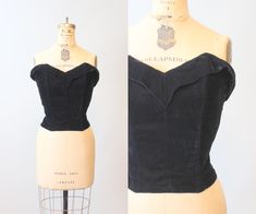 "Sweet 1950's bustier done in a soft black velvet. Pointed sweetheart neckline, folded pointed detail and button back. Fully boned and lined.  Brand: unknown Size on tag: none Fits like: xs Color: black Material: Velvet Condition: Excellent Vintage: tips of boning are just barely showing through the lining, not seen when worn. ✂-----Measurements  Bust (underarm seam) : 32\" Waist: 26\" Total length: 14.25\"" Fitted Velvet Top For Formal Occasions, Vintage Sleeveless Top With Boned Bodice, Velvet Bustier, Hostess Dresses, Bias Cut Dress, Bubble Dress, Gowns With Sleeves, 50s Fashion, Bustiers