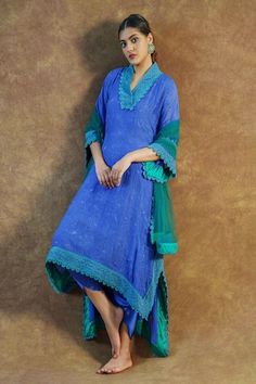 Ink blue kaftan style kurta with lace embroidery. Comes with sky blue dhoti pant and a dark green dupatta. - Aza Fashions Bohemian Blue Anarkali Set With Chikankari Embroidery, Blue Bohemian Chanderi Palazzo Set, Blue Bohemian Set With Sheer Dupatta, Blue Bohemian Kurta For Transitional Season, Blue Bohemian Designer Wear Dupatta, Blue Bohemian Style Designer Wear Dupatta, Unstitched Blue Bohemian Salwar Kameez, Unstitched Bohemian Blue Salwar Kameez, Blue Bohemian Kurta With Dupatta