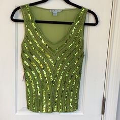 Beautiful Chartreuse Mesh Top With A Really Pretty Neckline, Covered With Beads And Sequins. New With Tag And In Pristine Condition. Top Is Extremely Stretchy. Approximate Measurements Laying Flat Are As Follows: Armpit To Armpit - 17”; Waist - 15”; Hips - 17”; Length - 22”. Top Will Easily Stretch 3 To 4 Inches Additionally. Embellished V-neck Top For Party, Embellished V-neck Blouse For Party, Embellished V-neck Party Top, Embellished Tops For Summer Festivals, Embellished Summer Tops For Festive Occasions, Embellished Tops For Summer Festivities, Glamorous Embellished V-neck Tops, Fitted Sleeveless Holiday Tops, Summer Festive Embellished Tops