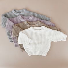 Our beautiful cosy knits are the perfect piece for your mini this season.  Made from beautiful soft cotton, these cosy knits are a must have piece to add to your little ones capsule wardrobe. Designed to last for years to come, our gender neutral pieces are perfect for the whole family.  Our knit sweaters are a loose fit. Please refer to our sizing chart for measurements. Due to the nature of knitted items, please allow a variance of 1-1.5cm for all items. Care instructions  Cold gentle machine Baby First Outfit, Outfit Photography, Knitted Items, Going Home Outfit, Cotton Jumper, Top Baby Products, Gender Neutral Baby Clothes, Personalized Clothes, Baby And Toddler