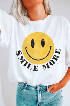 SMILE MORE HAPPY FACE GRAPHIC TEE*PLUS SIZE AVAILABLE: 8626X-TS-PLUS*- PREMIUM 100% AIRLUME COMBED AND RINGSPUN COTTON- RETAIL FIT - UNISEX SIZING- TEAR-AWAY LABEL Style: CASUAL Print / Pattern: SMILE MORE HAPPY FACE Silhouette: T-SHIRT Fit: UNISEX Neck Line: CREWNECK Sleeve: SHORT SLEEVE Made In: USAFabric Contents: 100% COTTON Stretch fabric Non-sheer fabric Care Instructions: Machine wash warm, inside out, with like colors.Tumble dry low.Medium iron.Do not iron decoration.Do not dry clean.Siz Funny White Tops With Logo Print, Funny White T-shirt With Logo Print, Fun White T-shirt, Fun White Top With Logo Print, Fun White Everyday T-shirt, Funny White T-shirt For Spring, White Graphic Tee With Smiley Face, White Smiley Face Graphic Tee, Fun White T-shirt With Funny Print