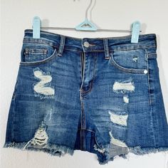 Judy Blue Denim Shorts Brand New Condition Size Small Ripped Short Dark Wash Jeans, Dark Wash Ripped Short Jeans, Distressed Mid-rise Denim Blue Shorts, Distressed Denim Blue Mid-rise Shorts, Dark Wash Ripped Mid-rise Jean Shorts, Ripped Mid-rise Denim Shorts, Trendy Dark Wash Mid-rise Jean Shorts, Distressed Dark Wash Short Bottoms, Distressed Dark Wash Short Length Bottoms