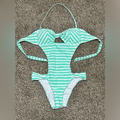 Bikini Lab One Piece Cutout Swimsuit Color: Mint Green/White Stripe Size: M Condition: Nwot, Tried It On With Undies But Never Worn. Ties In Back, Neck Strap Removable, Sparkly And Super Cute!! Green Triangle Top Bodysuit For Beach Season, Summer Striped Bodysuit For Beach, Striped Summer Bodysuit For Beach, Striped Bodysuit With Lined Body For Vacation, Striped Lined Bodysuit For Vacation, Green Backless One-piece Swimsuit For The Beach, Green Backless One Piece For The Beach, Green Backless One-piece For The Beach, Striped One-piece Bodysuit For Beach