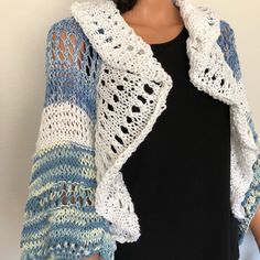 I Designed And Hand Knitted This Shrug, Sweater, Bolero, Shawl. Cotton Yarns In Ombr Blue And White And White Valance Trim. Wide 3/4 Sleeves. Solid And Lace Style Hand Knit. White Valance Trim Bottom And Top . Great Spring And Summer Shrug That Will Be The Focal Point Of Your Outfit On Dress Up Or Dress Down Days. Size : S/M Measures: 30” Arm Pit To Arm Pit Designed And Hand Knitted In Usa! White One-size Sweater For Layering, White Casual Knitting Pattern, Spring Knitting Pattern One Size, Casual White Knitting Pattern, White Knit One-size Cardigan, One Size Spring Knitting Pattern, Casual White Knitting Pattern For Spring, White Open Knit Cotton Cardigan, White Knitted Sweater For Spring