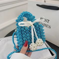 Falling in love with this luxury handmade beaded crossbody handbag.  Good for any occasion, especially formal events 🥰 Available in white/light blue/blue/pink colors. Message me with any questions for further assistance :) Blue Party Shoulder Bag With Mobile Phone Holder, Summer Evening Bag With Pearl Handle As Gift, Blue Shoulder Bag With Mobile Phone Pocket For Party, Blue Crossbody Evening Bag As Gift, Blue Crossbody Evening Bag For Gifts, Blue Rectangular Bag With Pearl Handle, Blue Rectangular Evening Bag For Mobile Phones, Elegant Blue Bag With Pearl Handle, Blue Square Party Bag