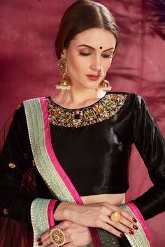 Showcasing a stunning black colored Banglori silk SabyaSachi Designer Lehenga With Floral Print, Dori , Zari and Embroidery Work.

  Accompanied by a  Designer Velvet choli With Diamond Work and black net Sequins dupatta with  lace details.
It can be customized up to 42 inches.