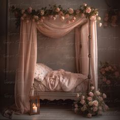 a bed covered in pink flowers next to a window with curtains and candles on it