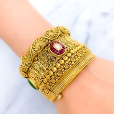 PRODUCT DETAILS Gold Purity(karat): 22k Item Weight(grams): 61.5 Item Finish: Oxidized Stone: Kundan Bangle Size: 2.5 Bangle Opening(diameter): ﻿2.3" Openable: Yes - Screw w/ Hinge Number Of Pieces: 1 Bangle Fusion Style Openable Bracelets For Festivals, Hand Set 22k Gold Festive Bracelets, Fusion Style Bangle Bracelets For Diwali, Elegant Openable Bracelets For Puja, Elegant Openable Bracelet For Puja, Hand Set Yellow Gold Chandbali Bangle, Festive Gold Bangle Bracelet Hand Set, Fusion Style Cuff Bangle Bracelet For Festivals, Hand Set Gold Bangle Bracelet In Temple Style