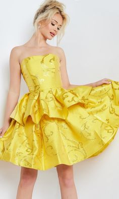 So impressive, this strapless short yellow party dress is the definition of perfection. With sparkly swirling glitter designs, this short designer dress by Jovani shimmers with every move at wedding receptions, homecoming, and lots of other semi-formal events. The short yellow cocktail dress features a strapless bodice with a figure-flattering princess cut, while the short tiered skirt flows to the hem in a fabulous a-line shape. An upscale style for the girl who loves endless compliments, this Short Tiered Skirt, Yellow Party Dress, Yellow Party Dresses, Yellow Cocktail Dress, Cocktail Dress Yellow, Yellow Party, Strapless Dresses Short, Fashion Bella, Strapless Party Dress