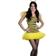 a woman in a bee costume posing for the camera